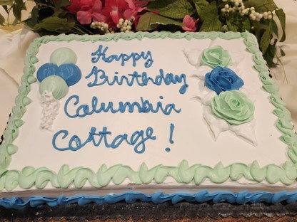 Birthday cake with decorative icing for celebration.