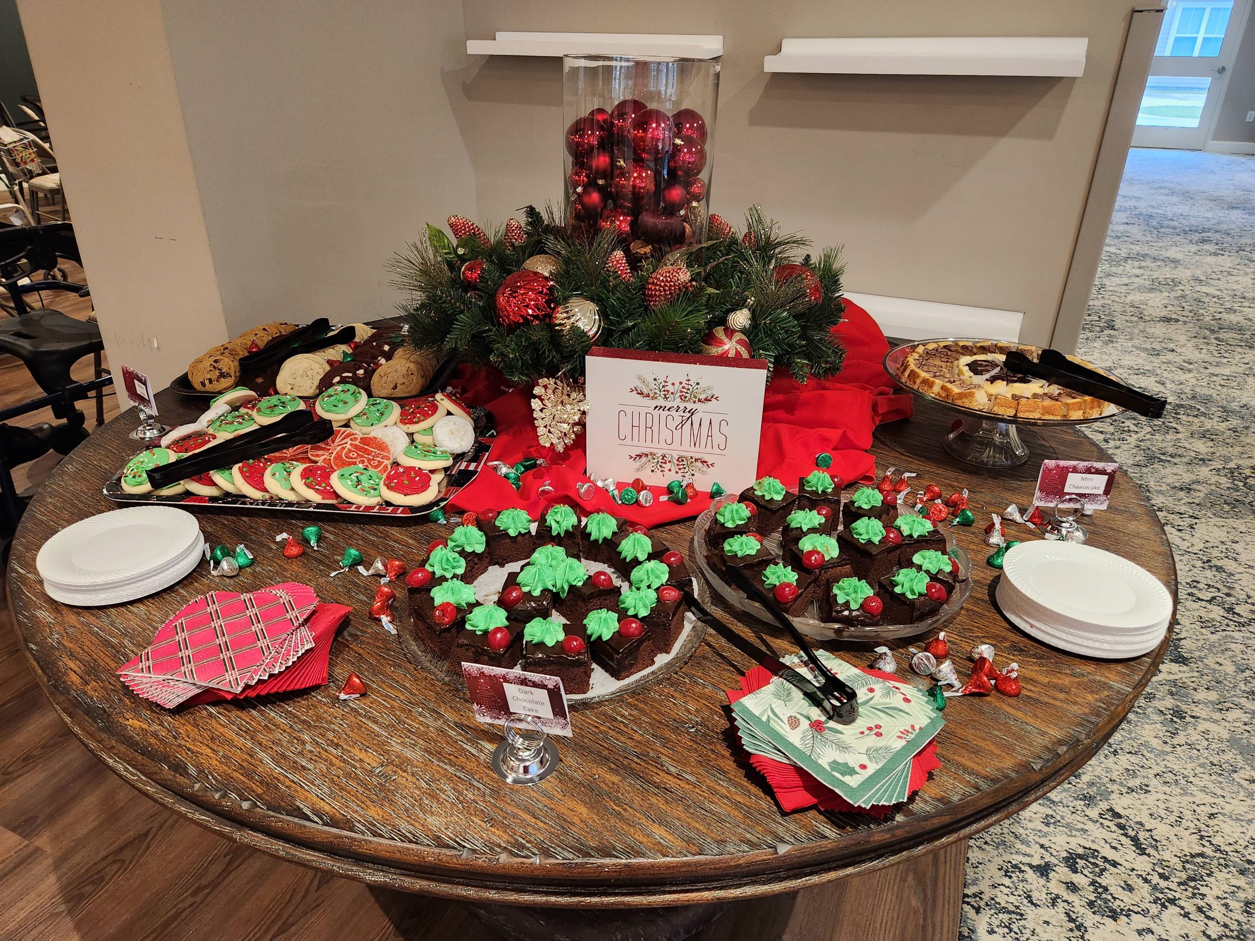 A festive table with assorted holiday desserts.