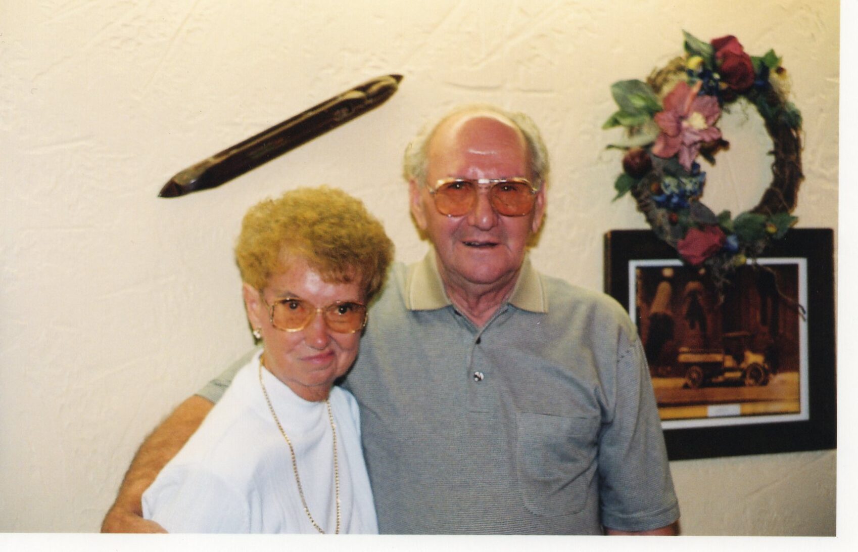 Senior couple smiling together indoors