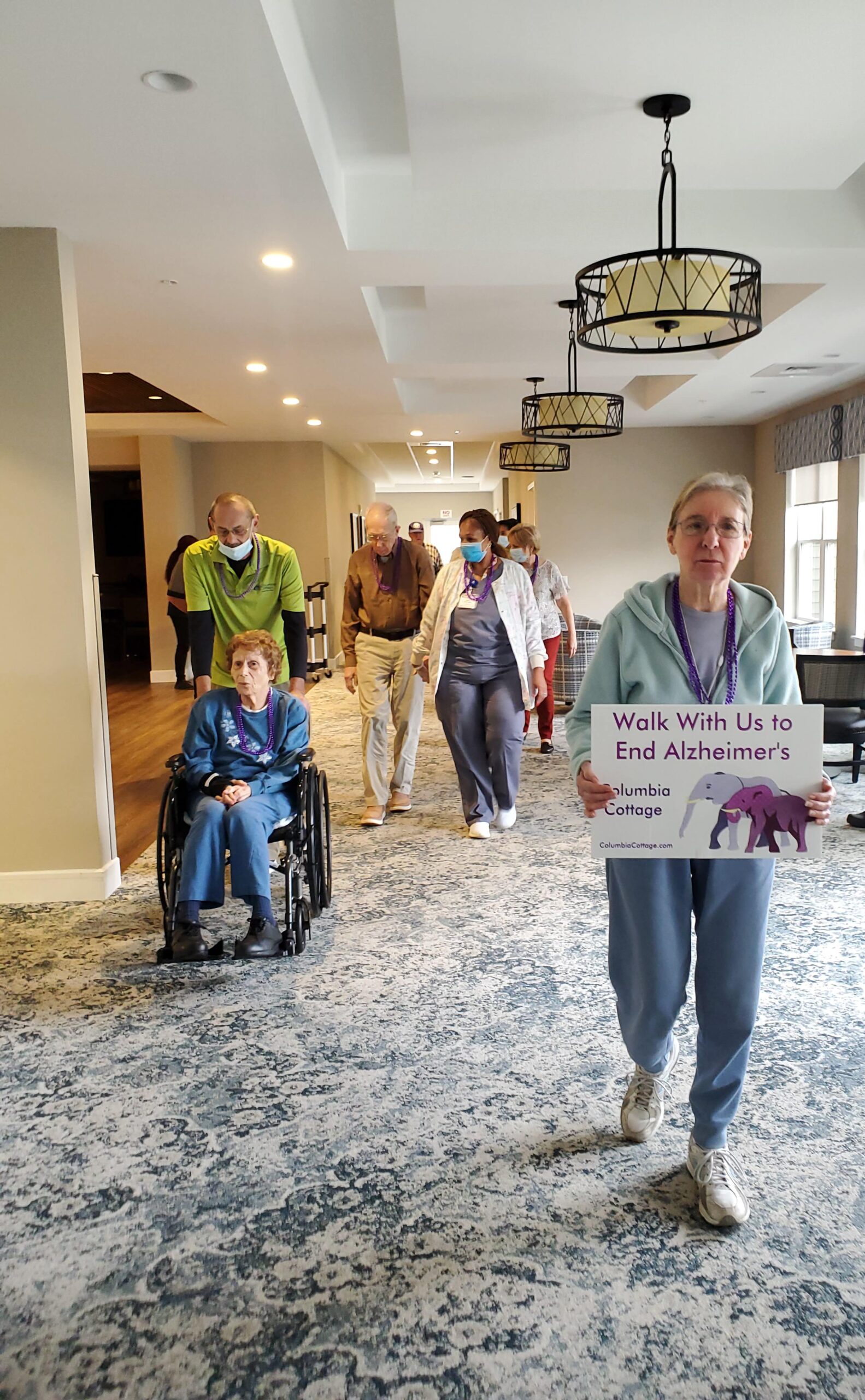 Residents participating in an Alzheimer's awareness walk.