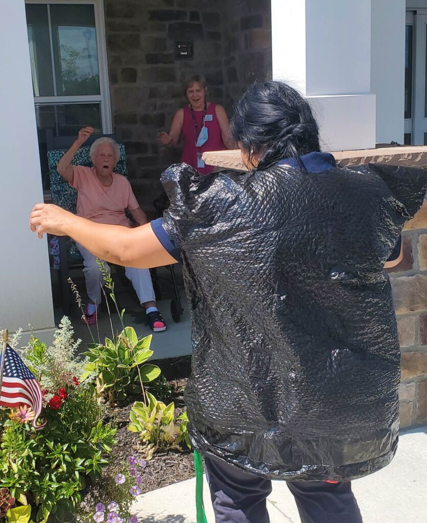 Residents engaged in a joyful outdoor activity.