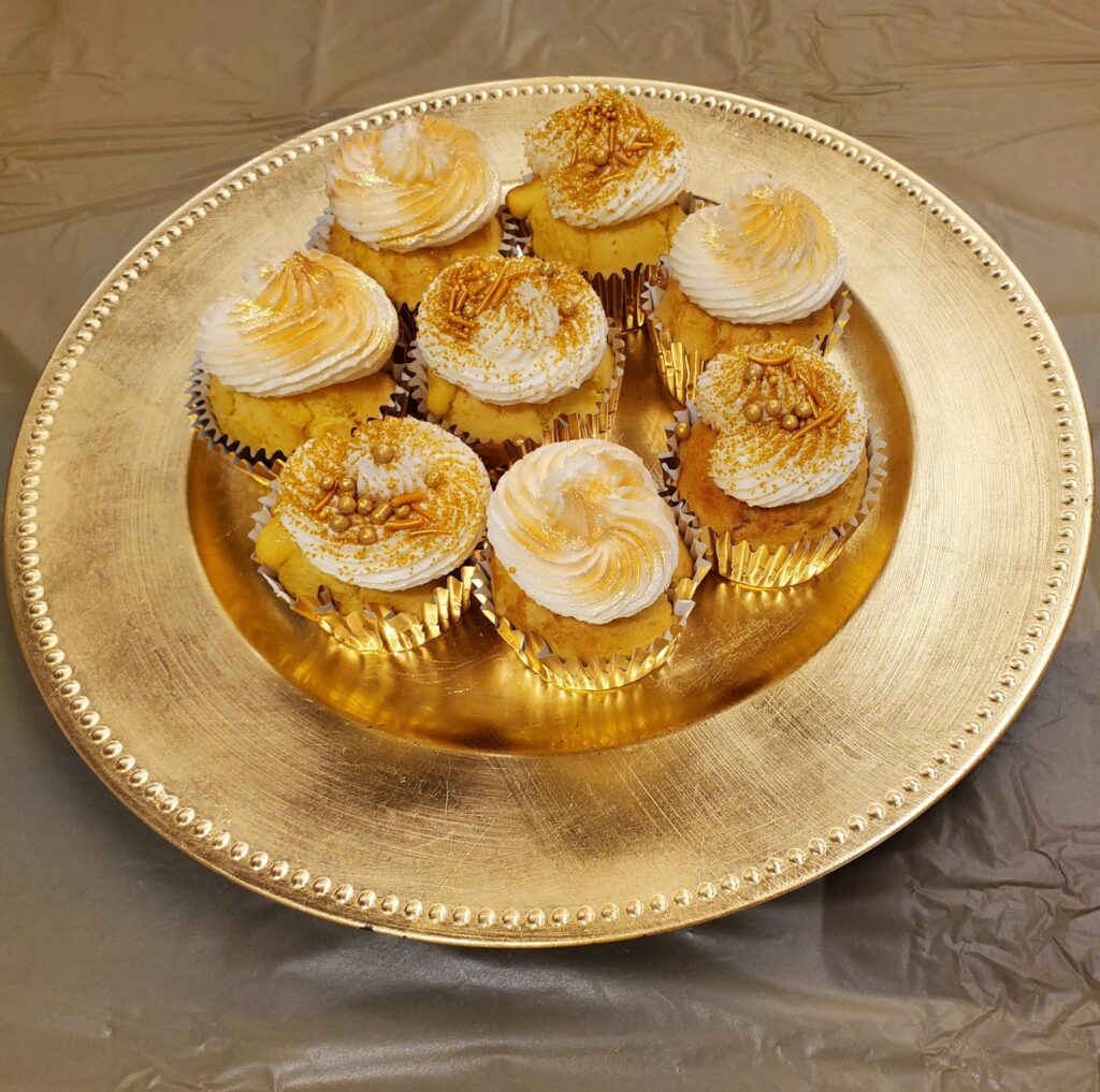 A platter of decorated cupcakes.