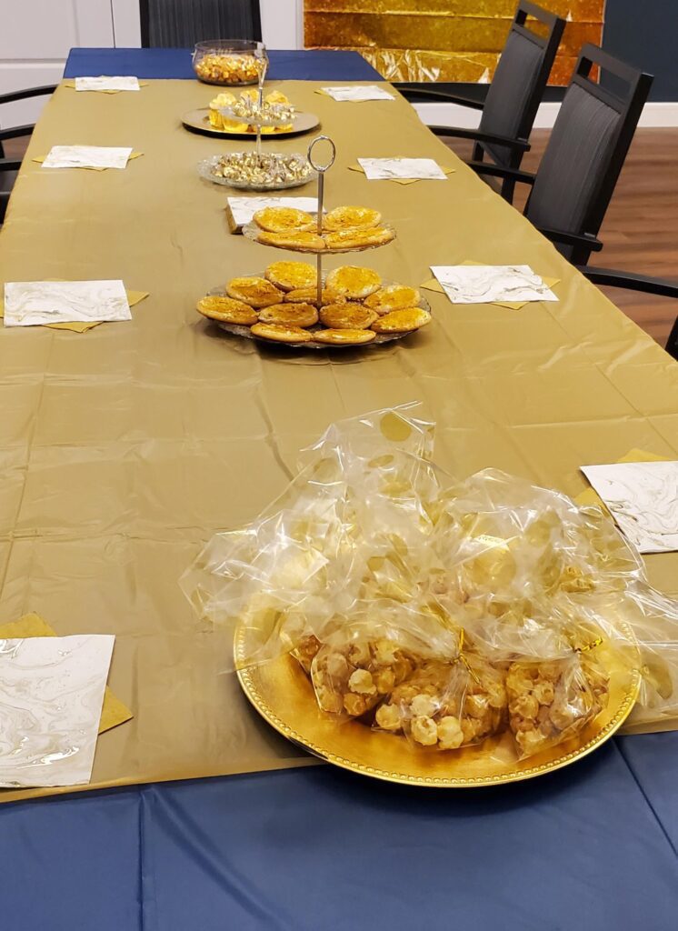 Decorated table with snacks and treats.