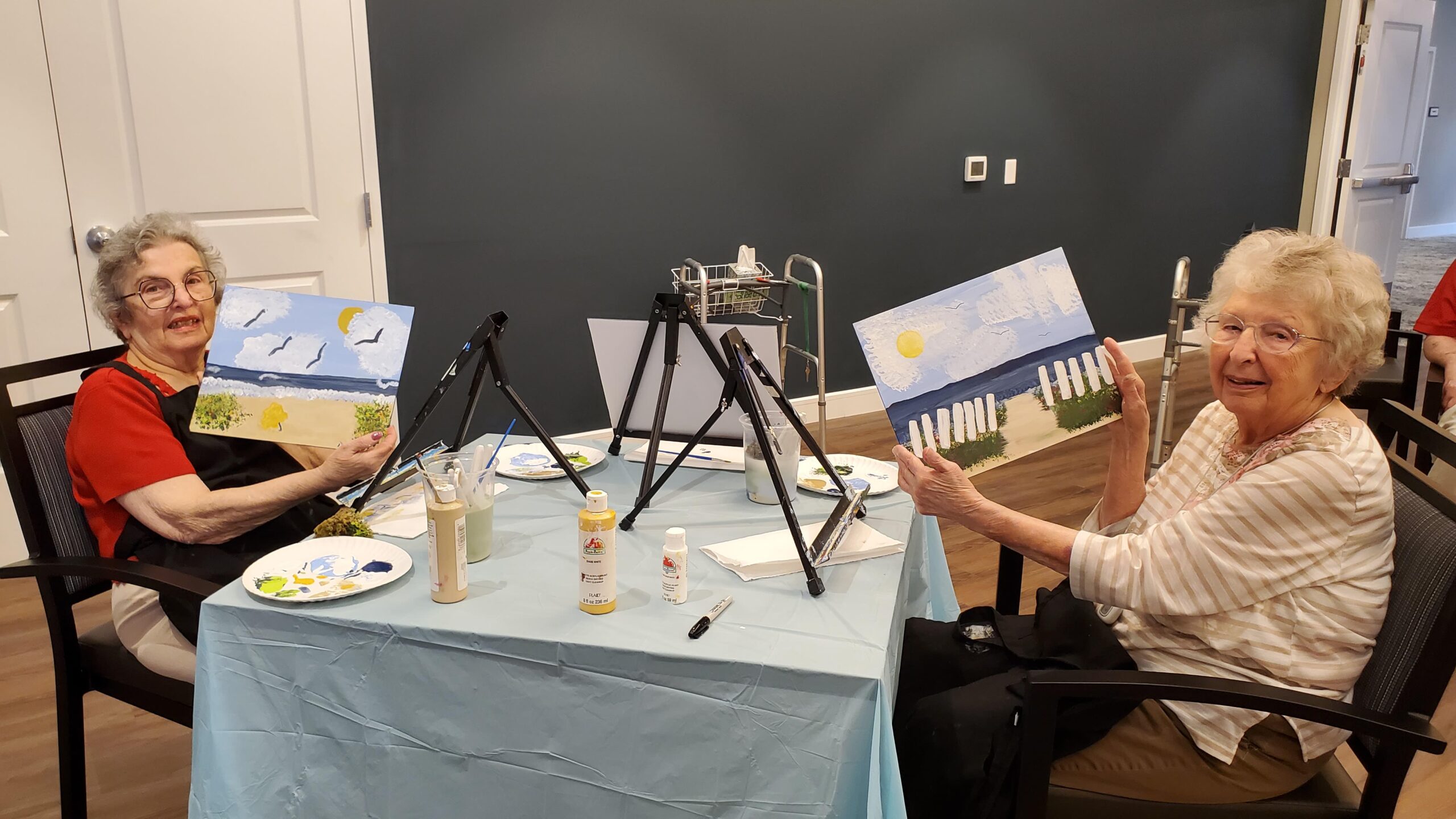 Residents painting during an activity session.