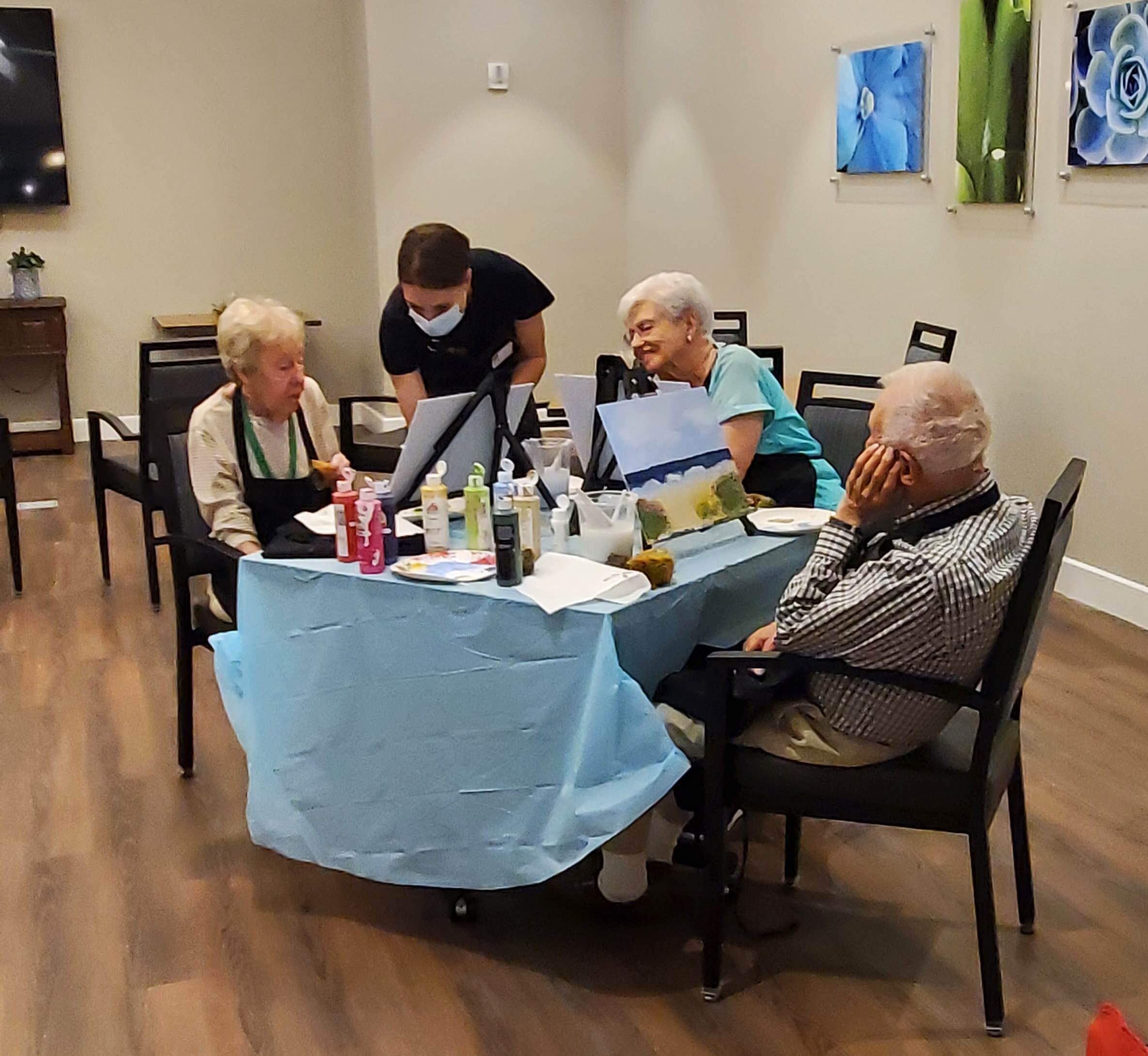 Residents engaging in an art activity.