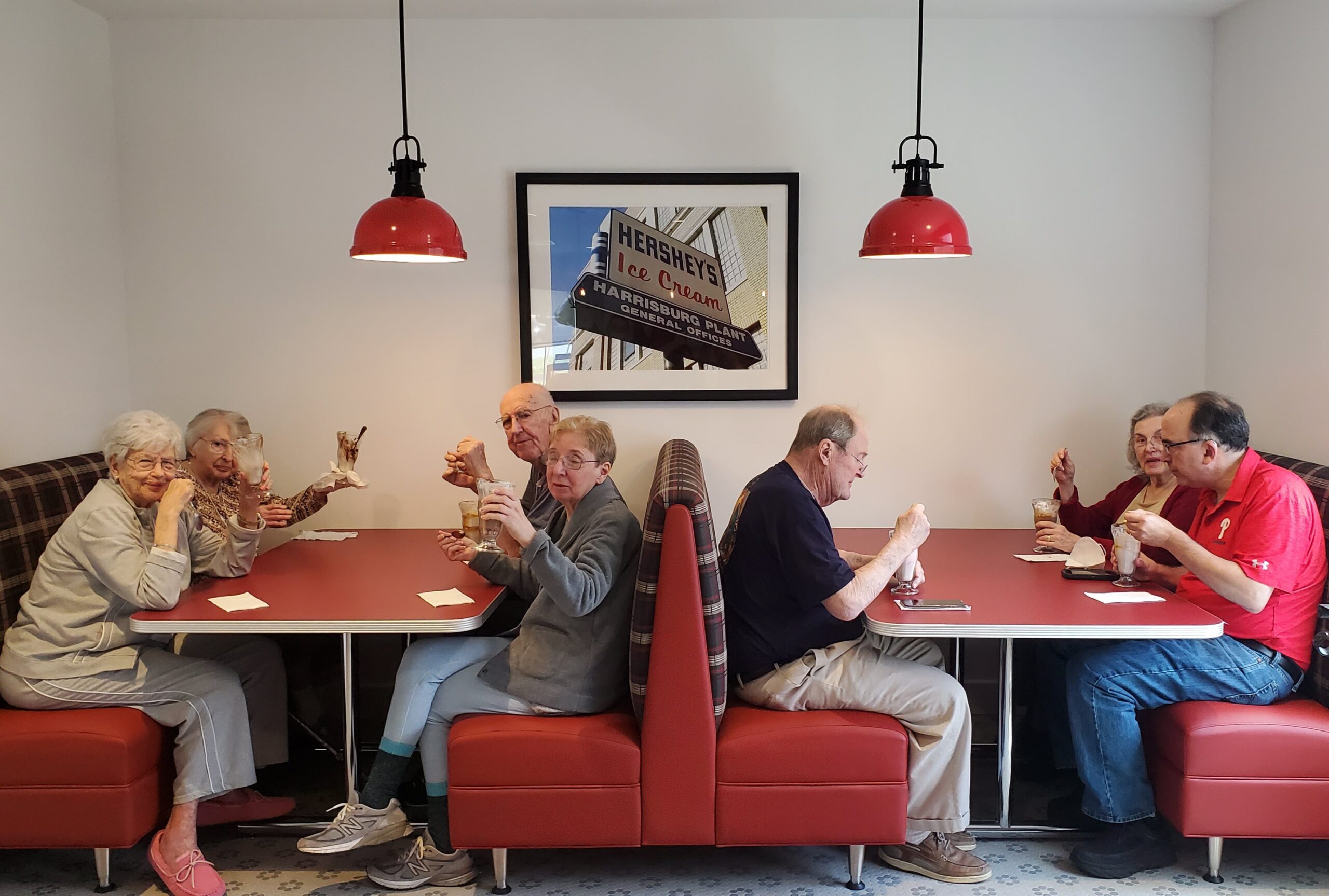 Residents enjoying ice cream in a common area