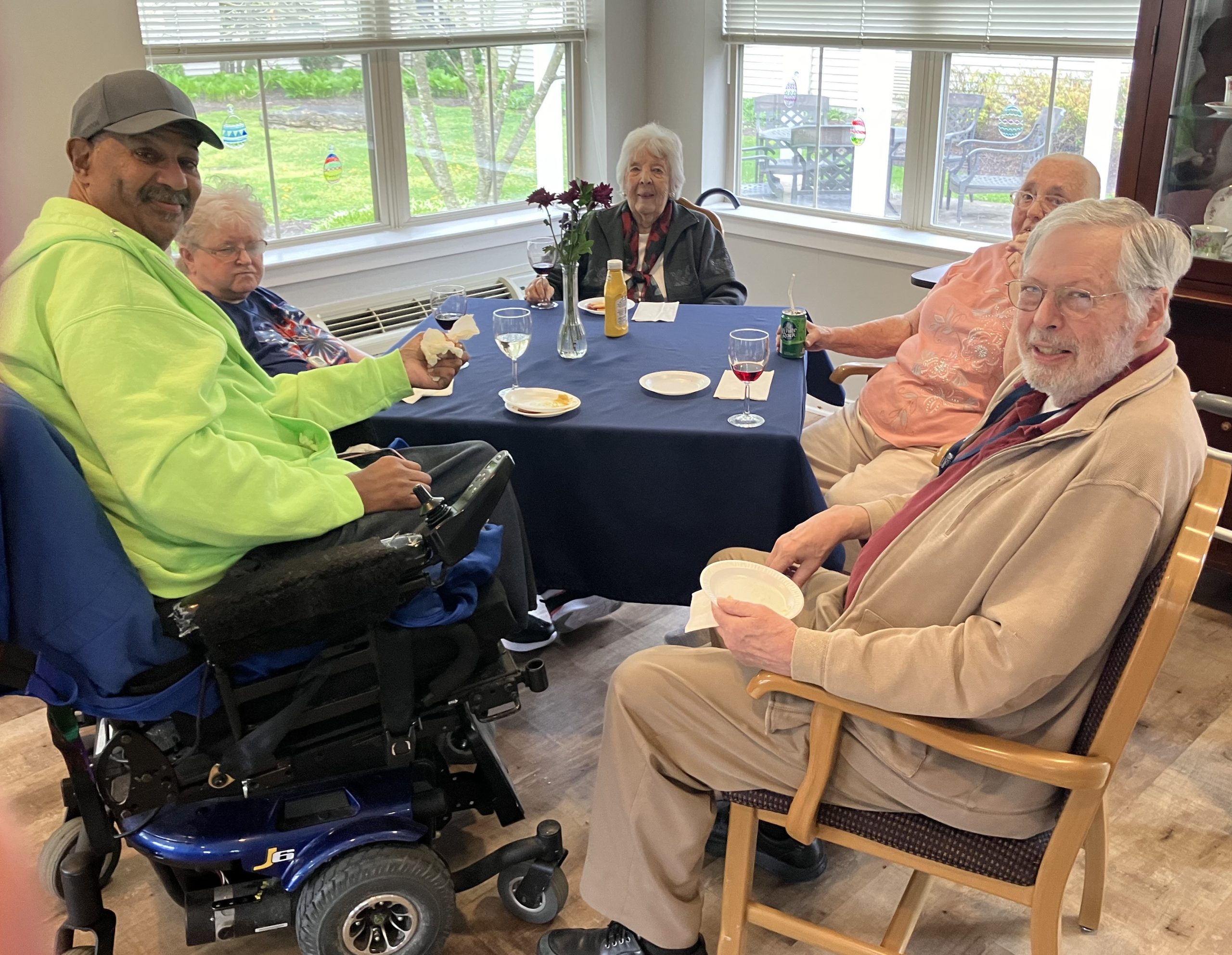 Residents enjoying time together in a common area.