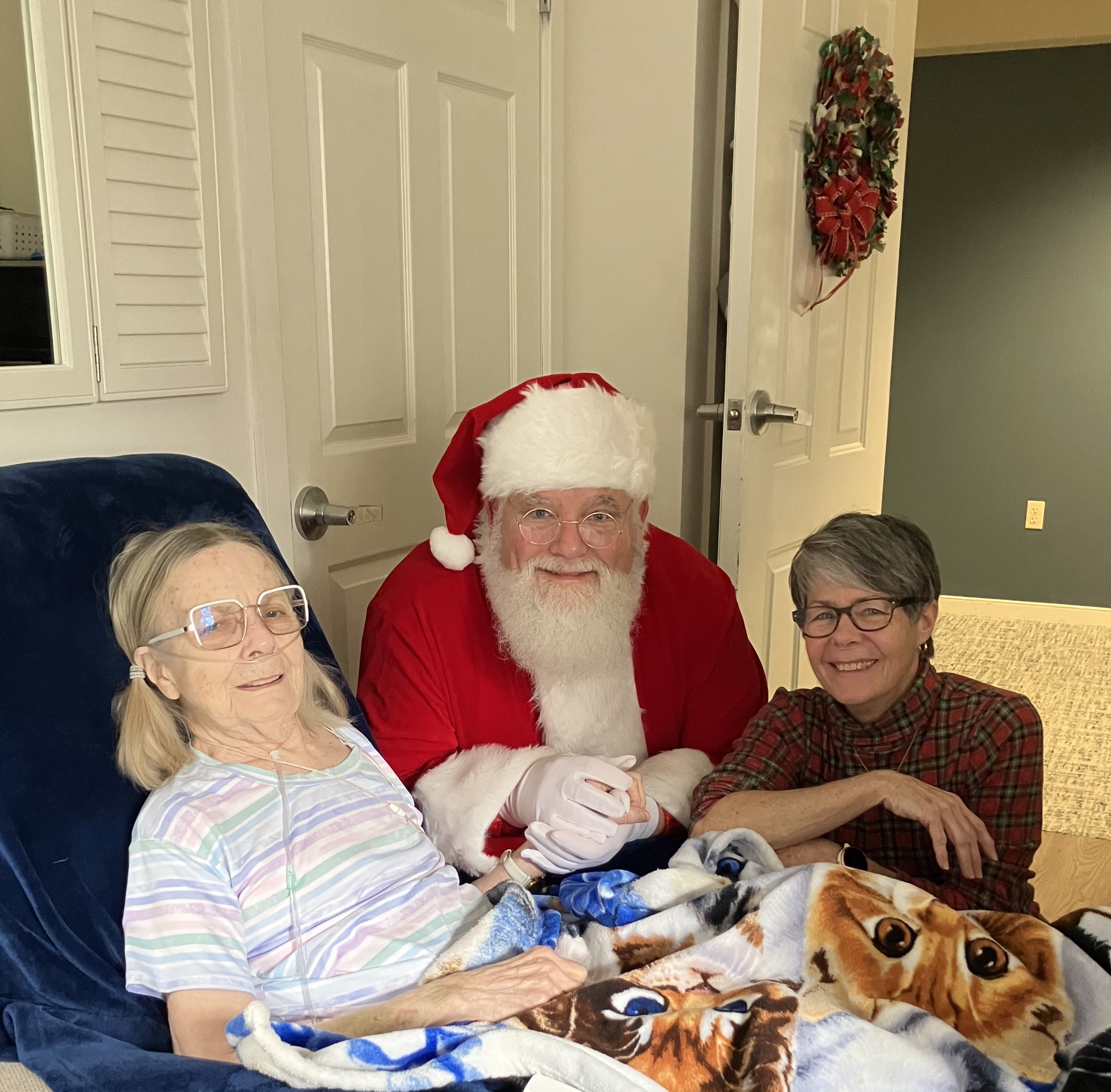 Residents enjoying a visit from Santa Claus
