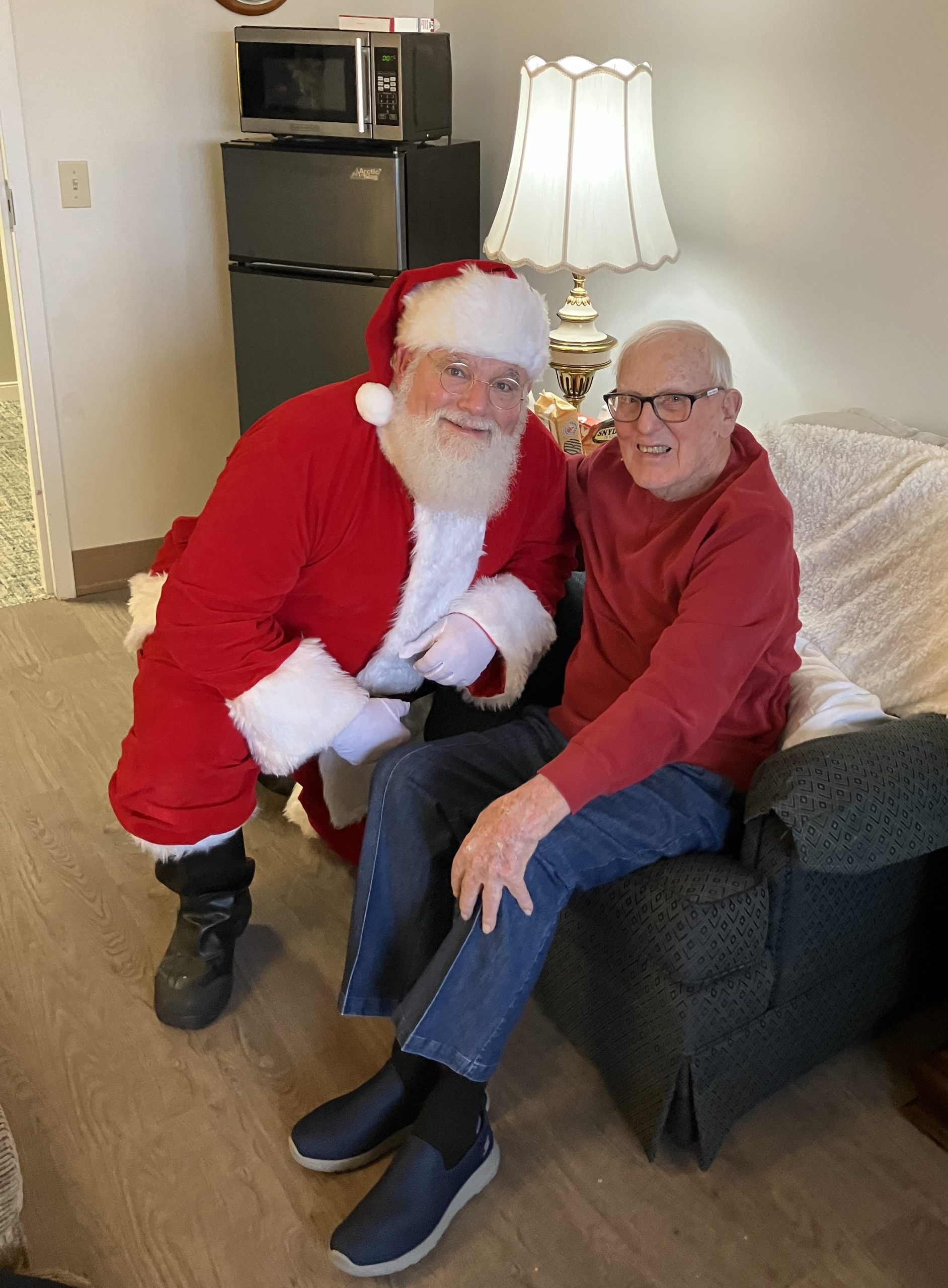 Resident enjoying Christmas with Santa