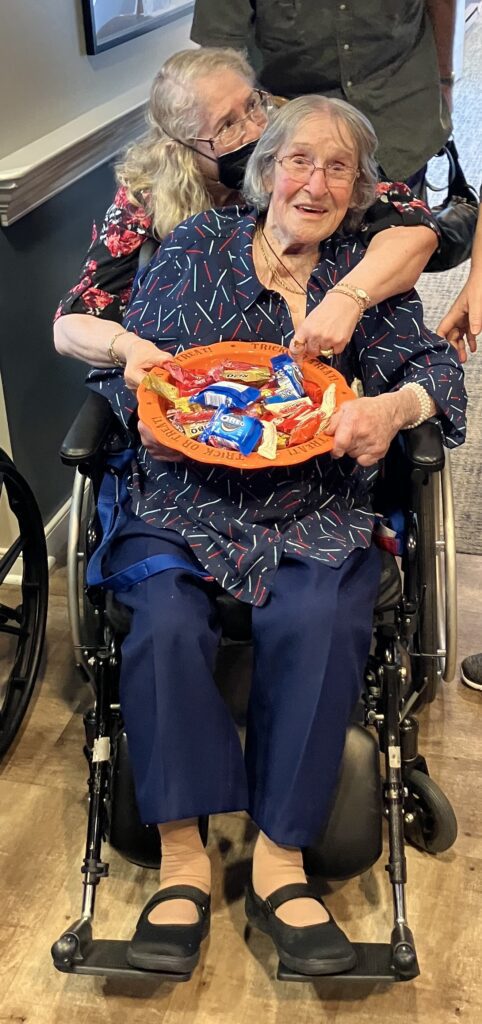 Residents enjoying snacks in a common area.