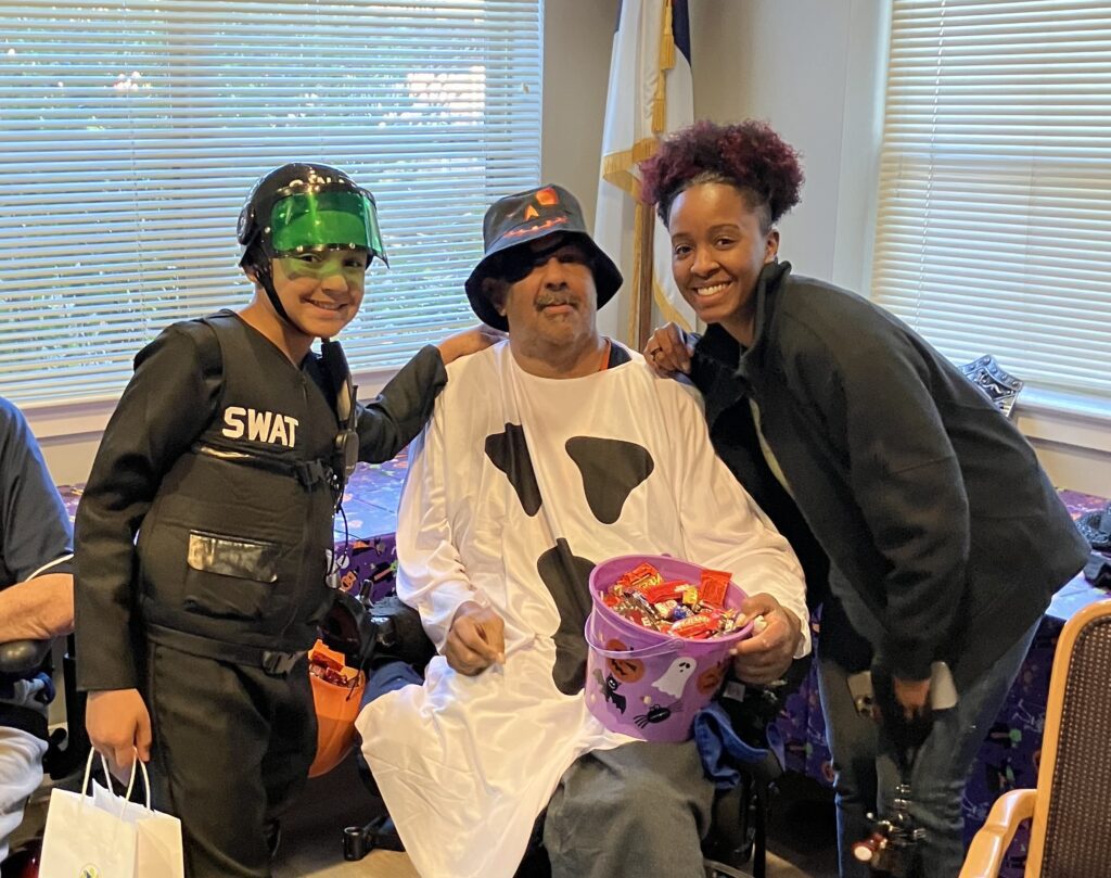 Residents and staff enjoying a Halloween celebration.