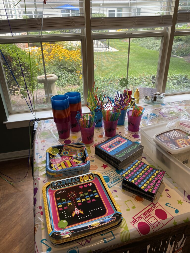 Decorative party setup with colorful tableware.
