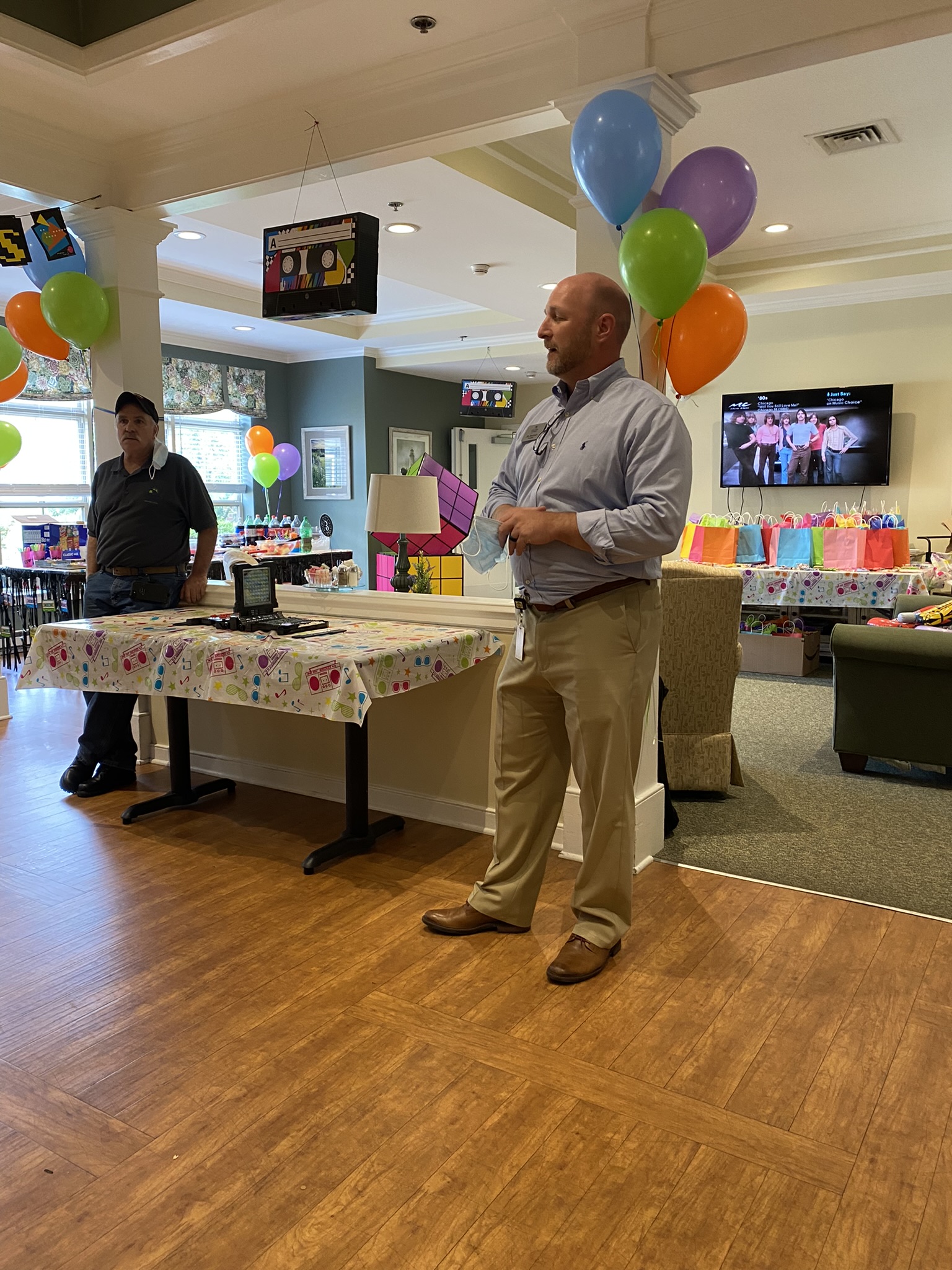 Celebration event with a speaker and decorations