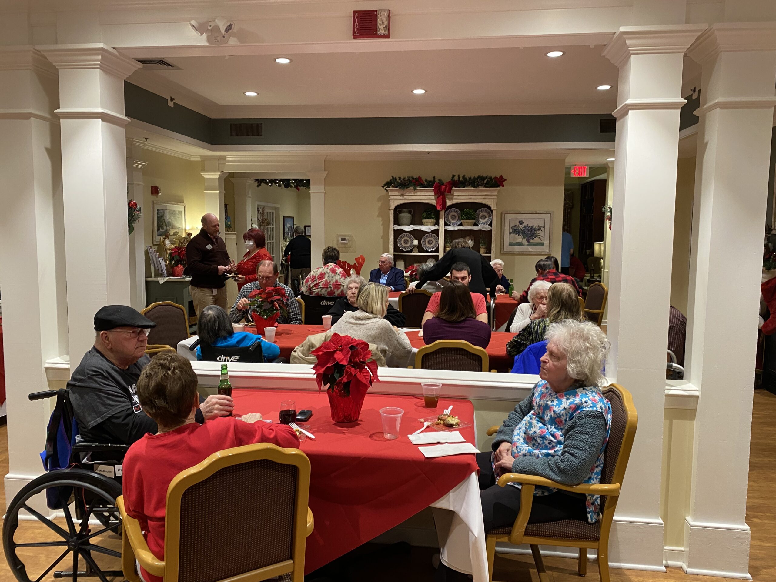 Residents enjoying a gathering in a festive setting.