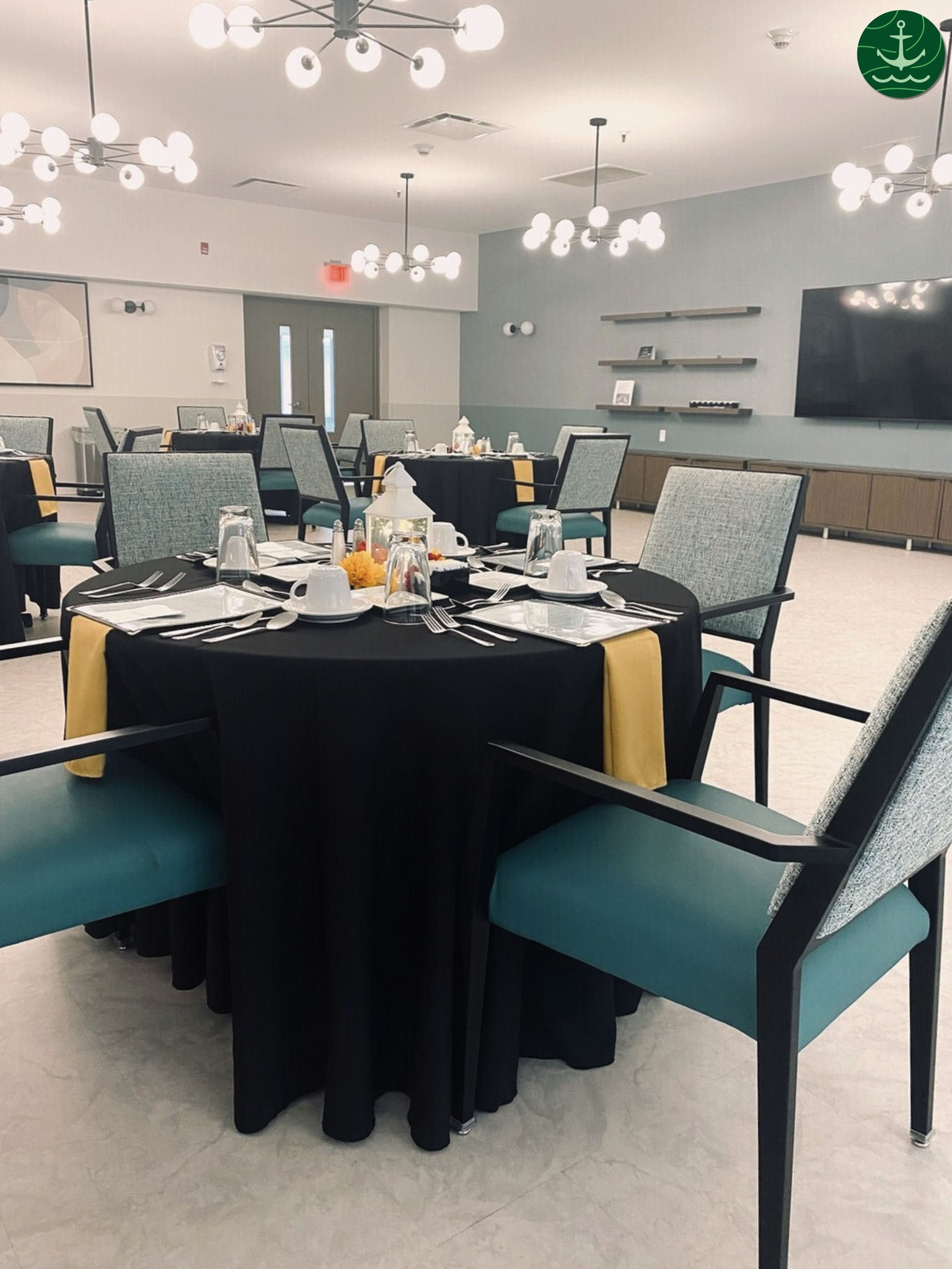 Dining room set for a meal with food and drinks