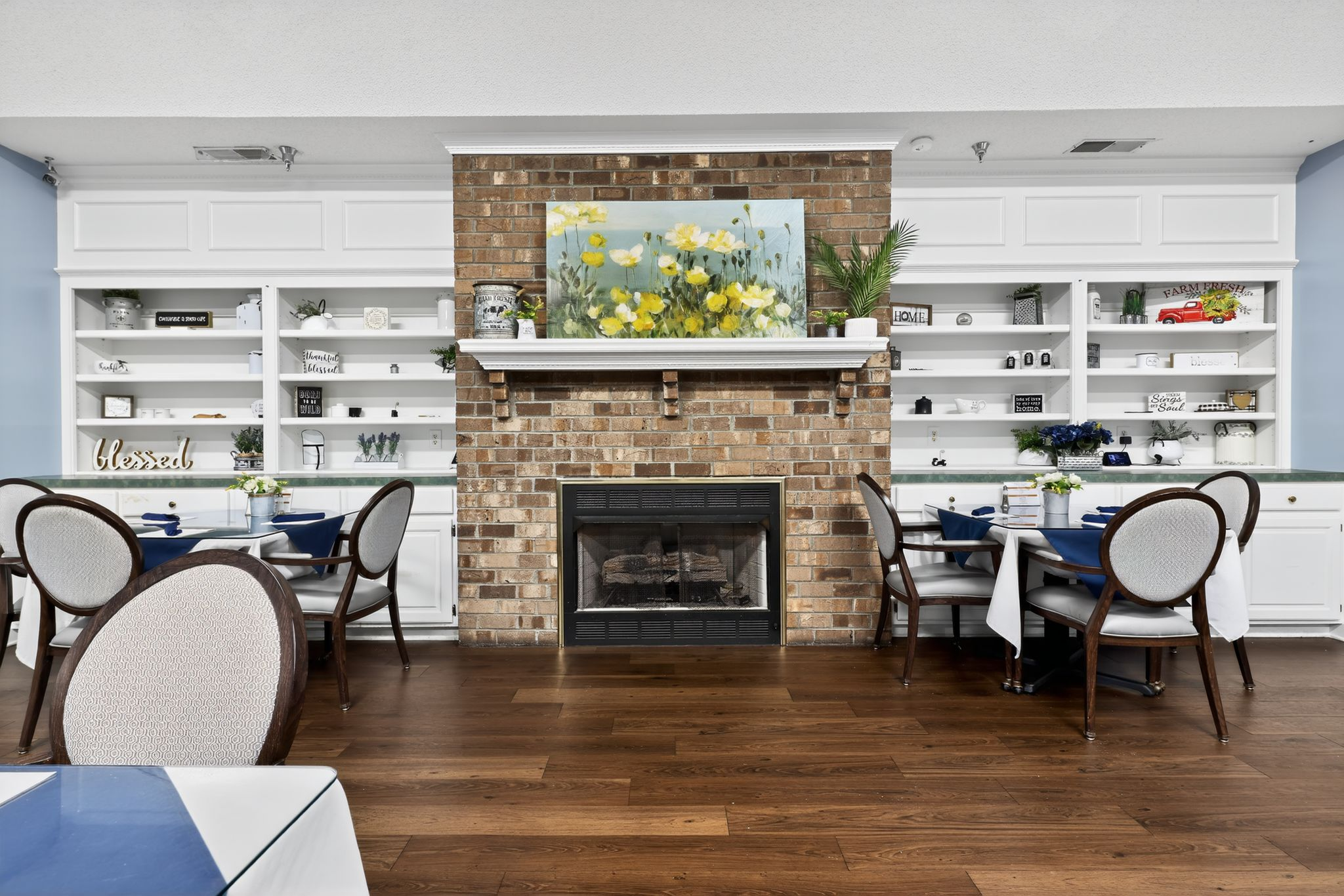 Dining area with elegant decor and fireplace