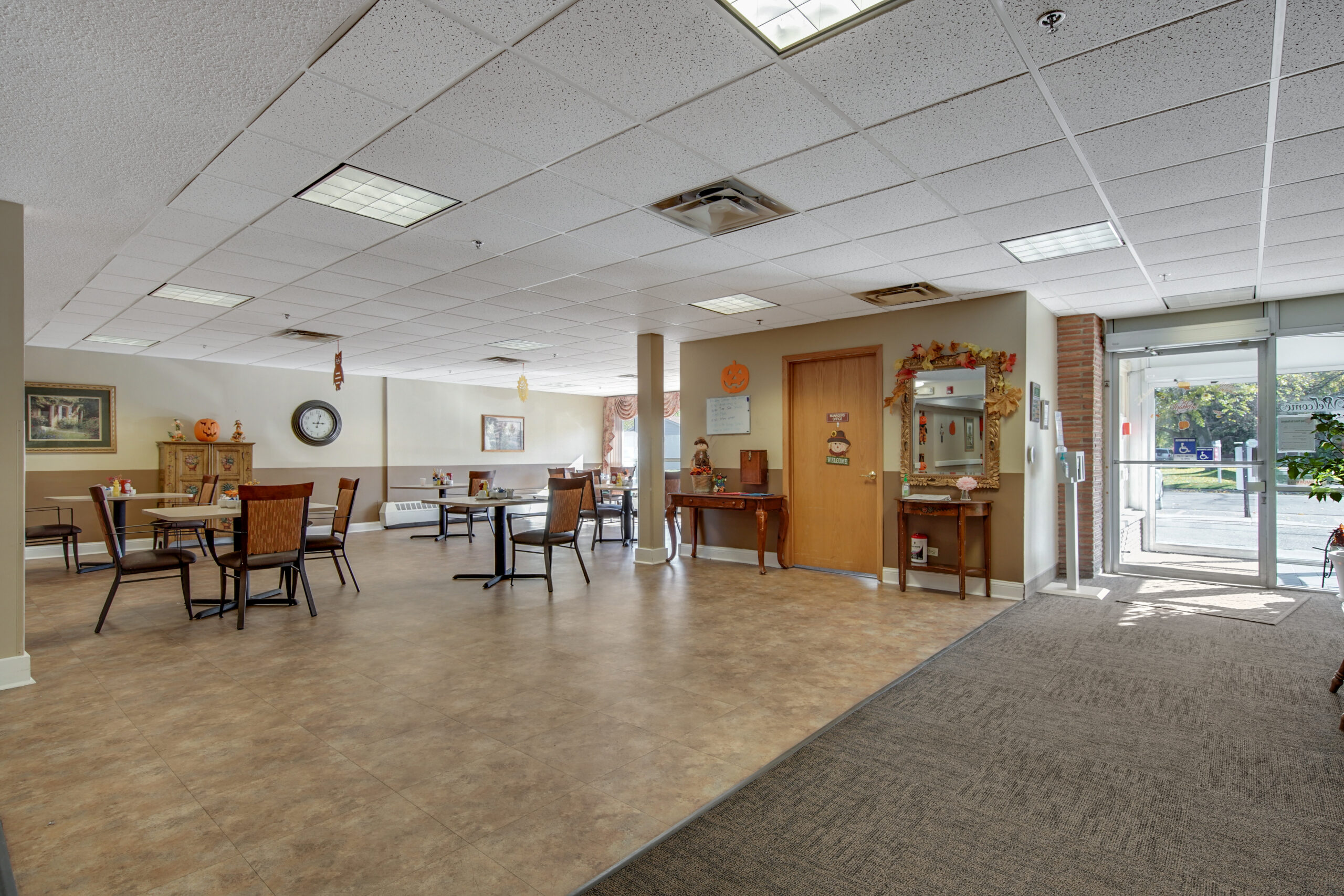 Interior view of a common area with dining tables