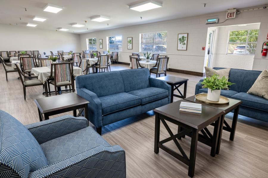 Common area with seating and dining tables