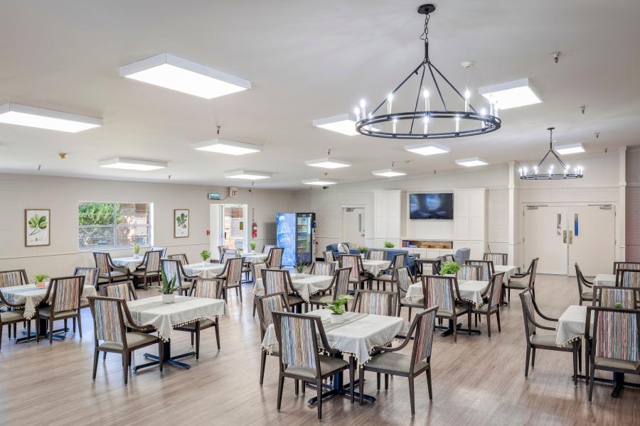 Bright dining room with tables and chairs