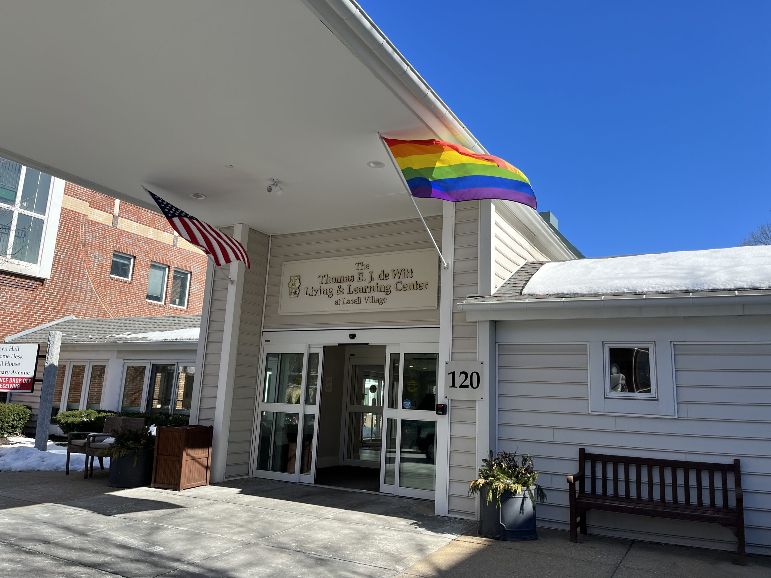 Exterior view of the entrance with flags