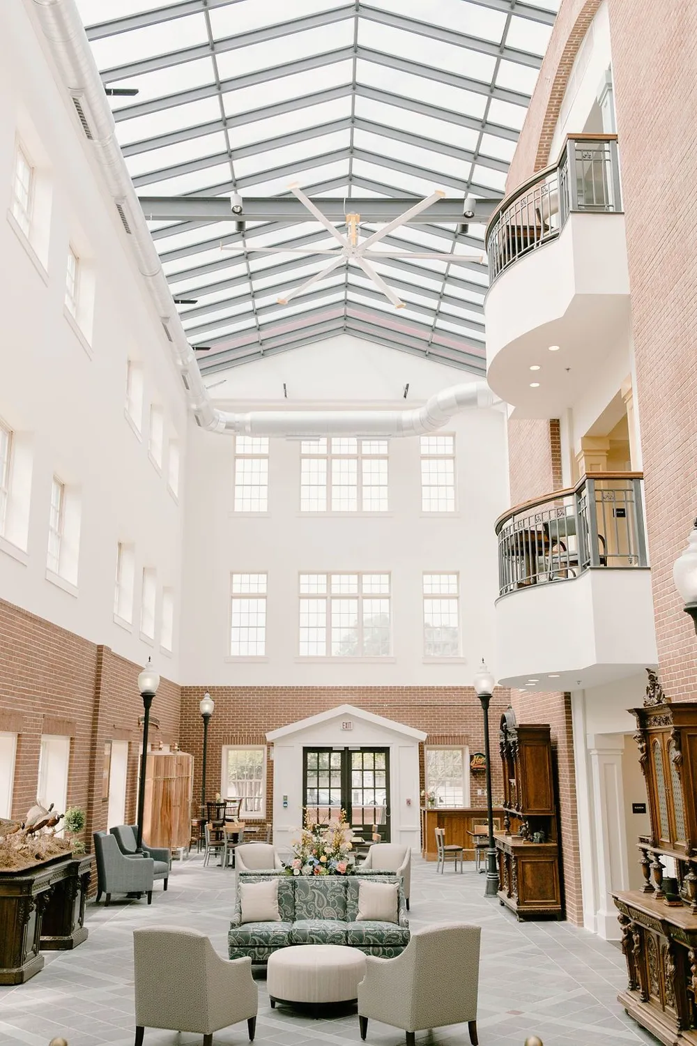 Interior view of a bright common area with seating