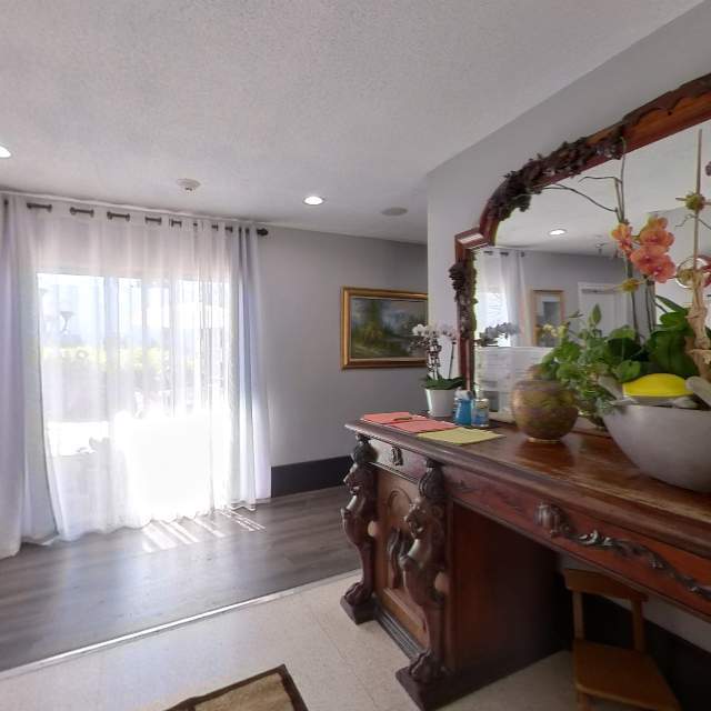 Bright common area with floral decoration