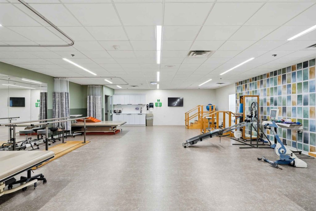 Interior view of a physical therapy room with equipment