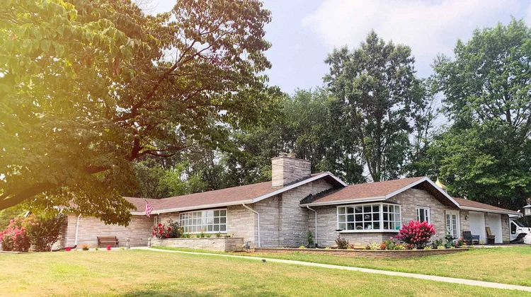 Exterior view of a single-story assisted living facility