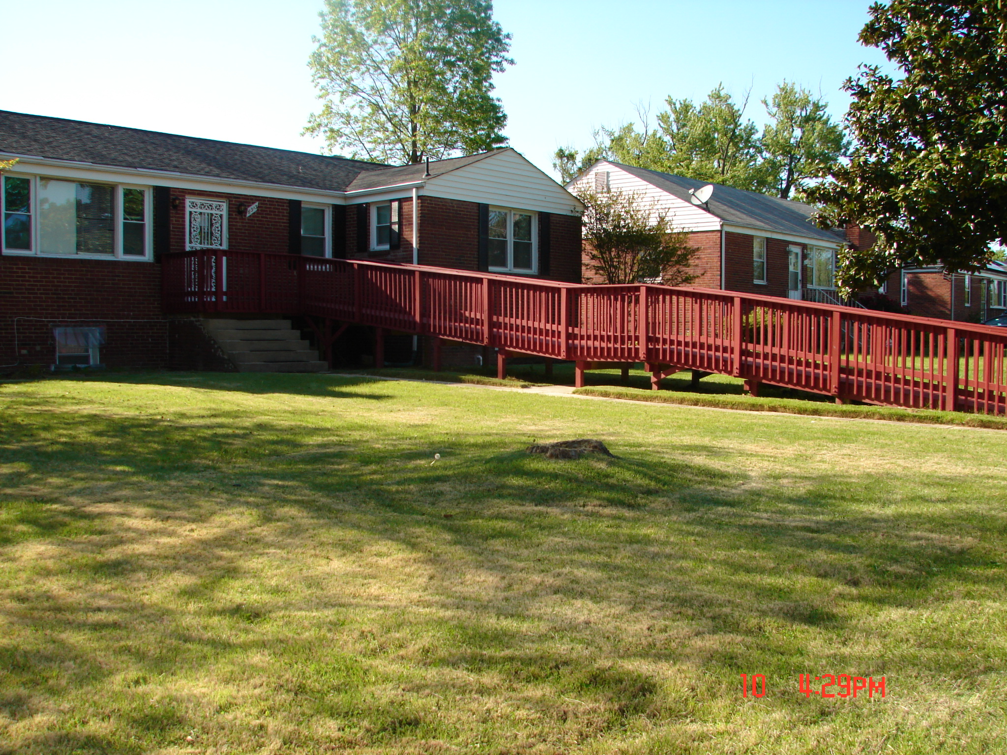 Exterior view of the assisted living facility with a ramp