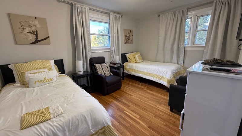 Twin beds in a cozy interior room