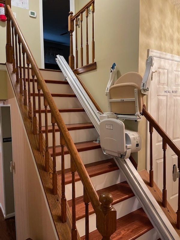 Stair lift installed on a staircase in a care facility