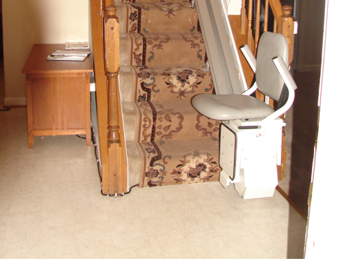 Stairlift on a staircase with decorative carpeting