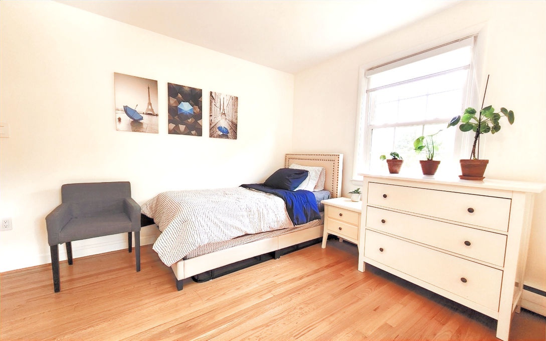 Cozy resident room with bed and decor