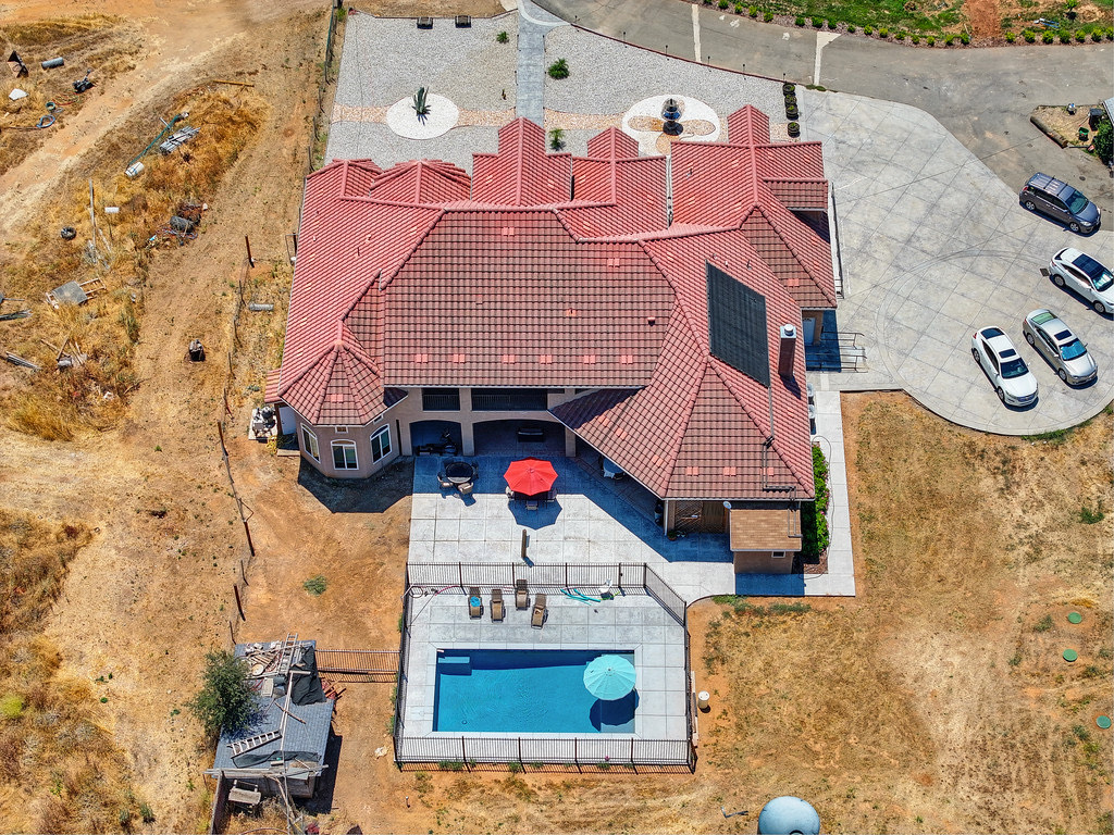 Aerial view of a senior care facility with outdoor pool