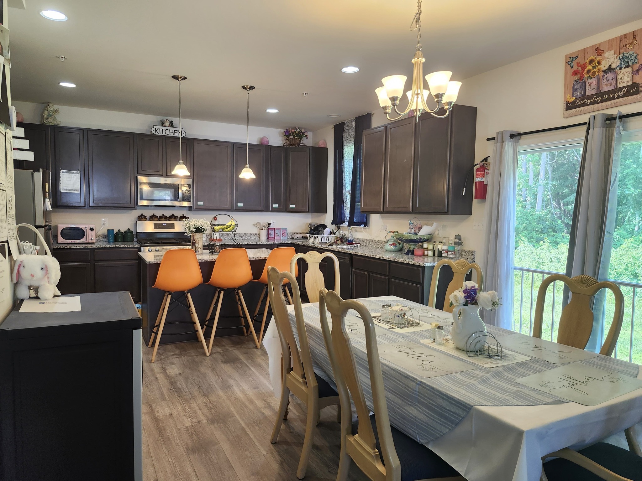 Bright kitchen area with seating and decor