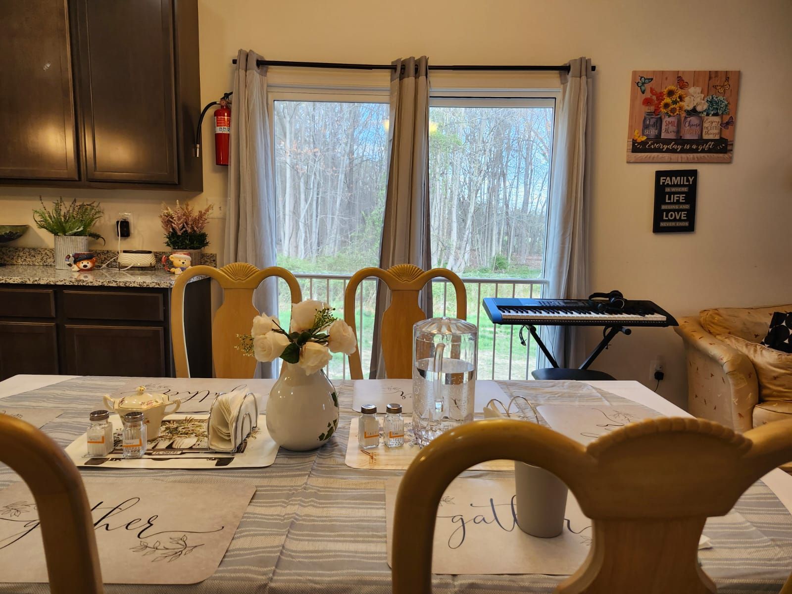 Cozy dining table setup with view of outdoor space