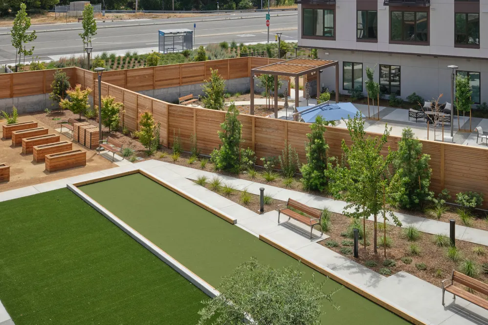 Outdoor space with seating and greenery